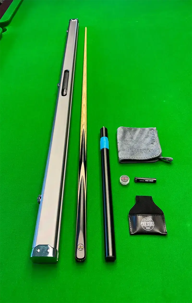 a snooker cue cue case cue extension and other snooker accessories on a snooker table