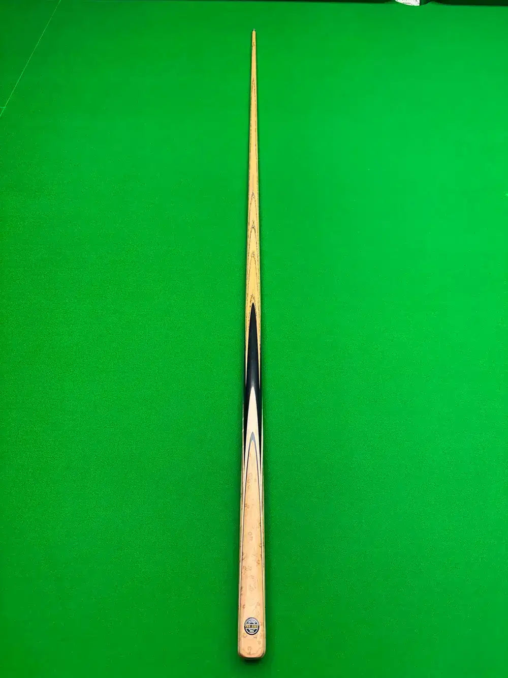 pro egde snooker cue on a snooker table