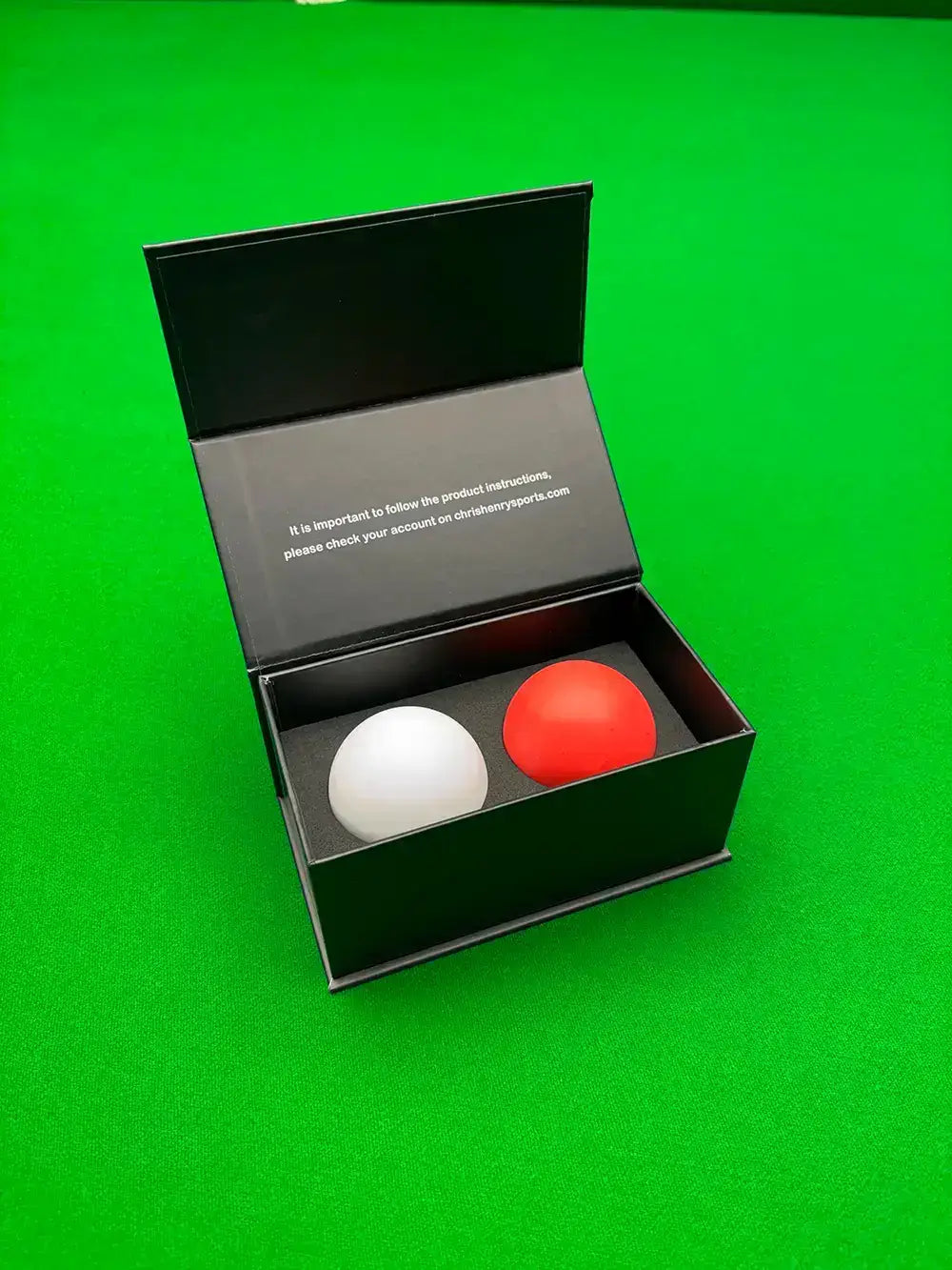 a set of the balls by chris henry in a black box