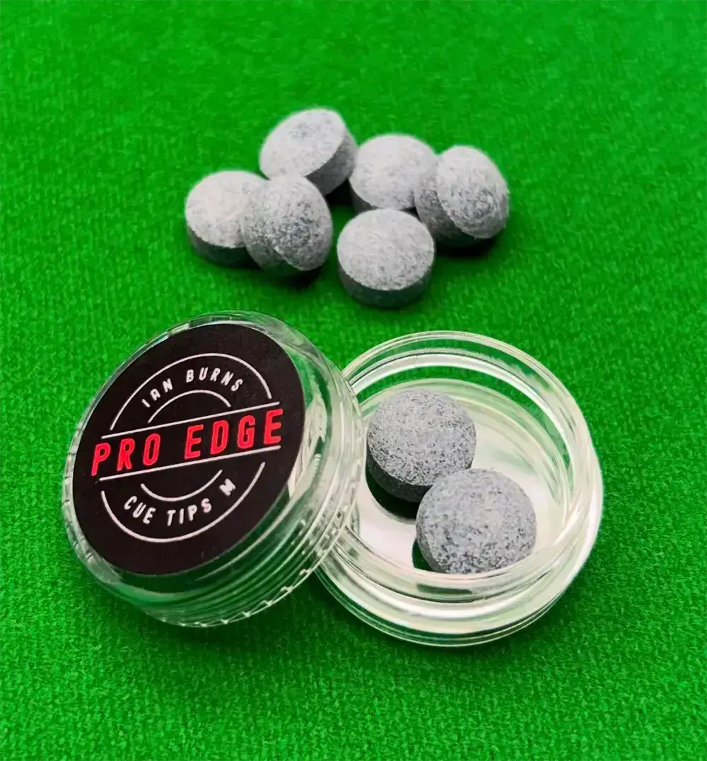 Pro Edge cue tips container with snooker tips on a snooker table