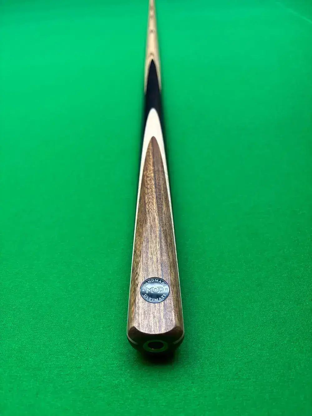 MOD snooker cue on a snooker table a ronnie replica
