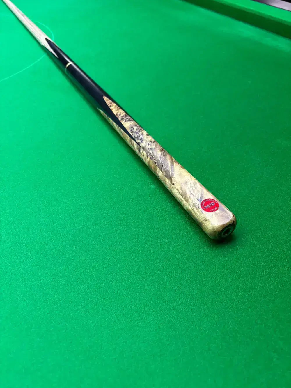 MOD snooker cue on a snooker table