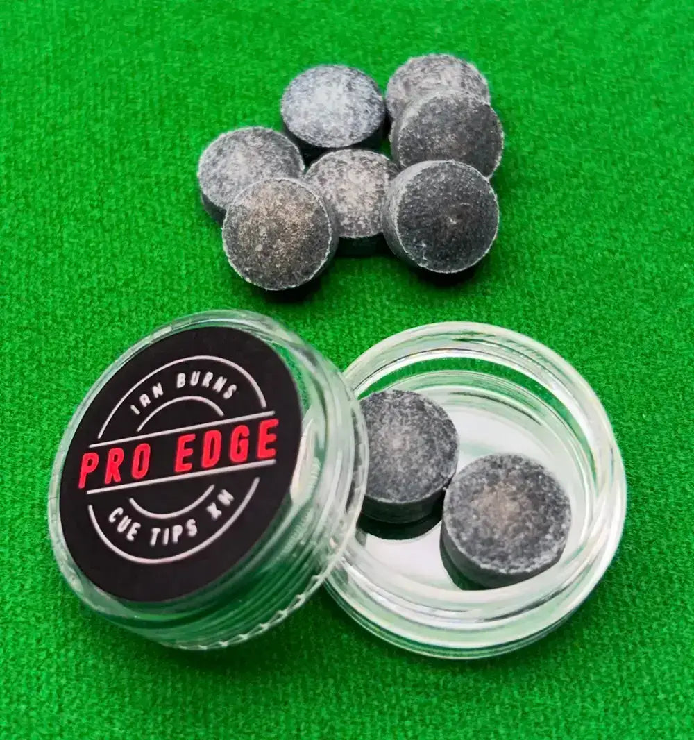Open container of Ian Burns Pro Edge Cue Tips on a snooker table