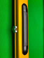 gold cue case with a black handle