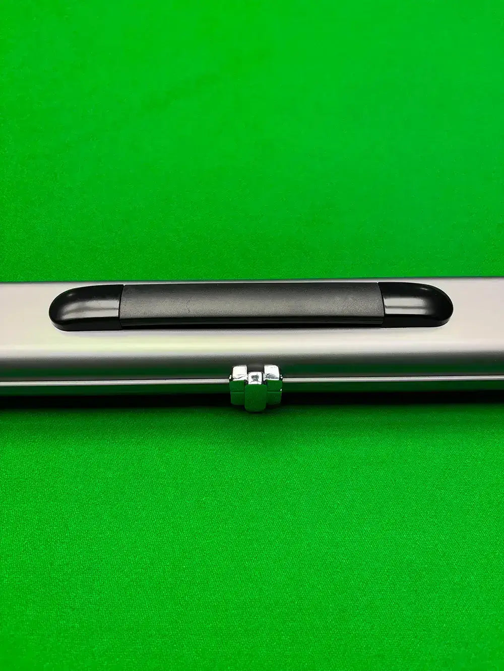 slimline cue case in the colour silver with a black handle