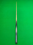 Snooker cue on a green background