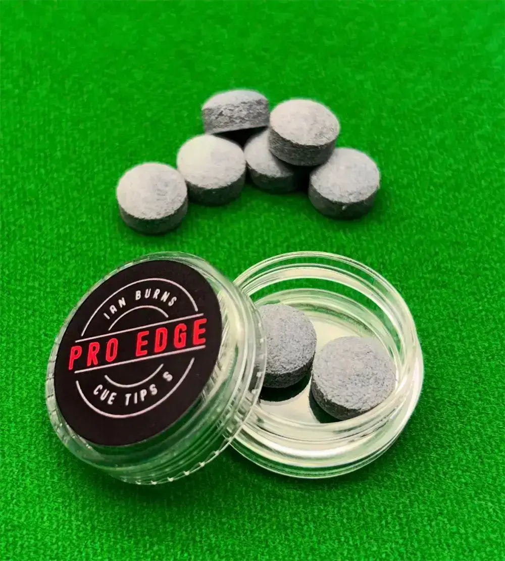 a transparent box of soft snooker tips on a snooker table