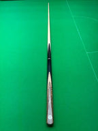 maple snooker cue on a snooker table