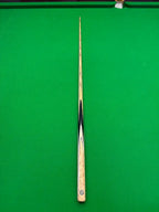 Ash Snooker cue on a green snooker table