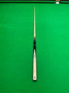 high-quality snooker cue on a green surface