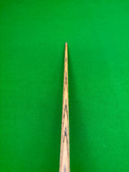 Snooker cue with a brass ferrule