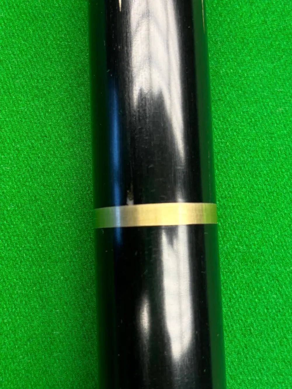 a closeup of a high quality snooker cue