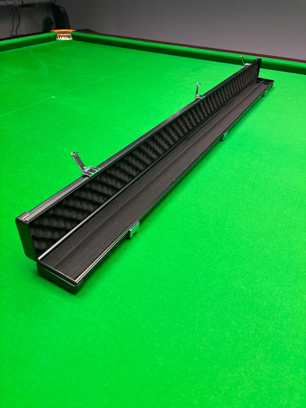 the interior of a snooker cue case