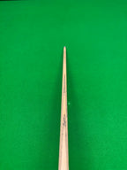 top view of an ash snooker cue on a snooker table