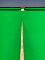 top view of a snooker cue with a brass ferrule and a pro edge tip