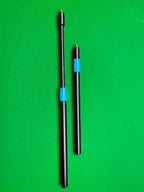 two cue extensions on a snooker table