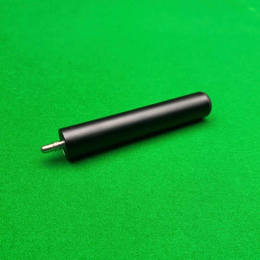 snooker cue extension on green snooker table 