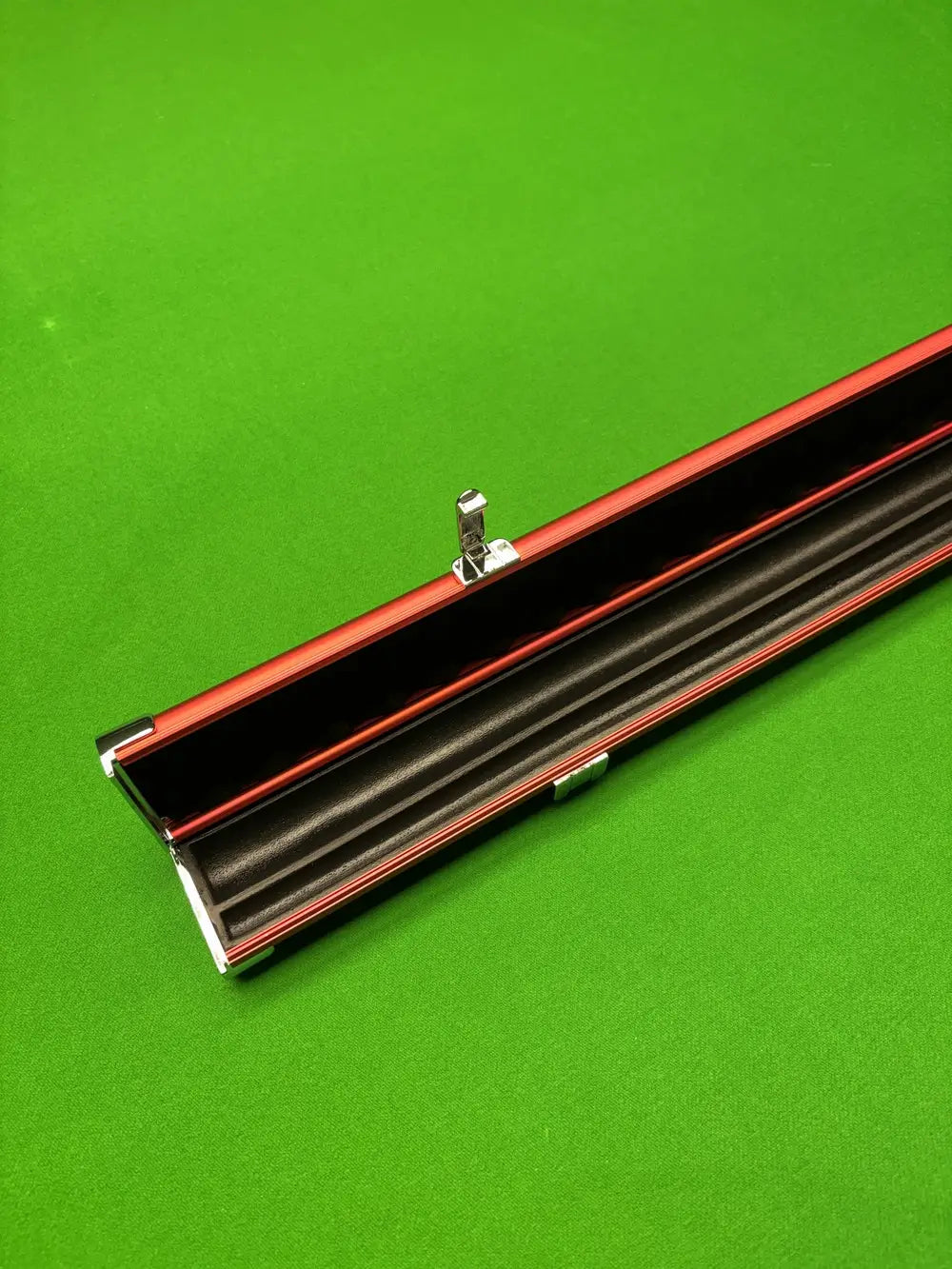 Slimline aluminium snooker cue case in vibrant red, featuring a sleek protective design